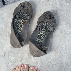 Well worn grey flats shoes used loved